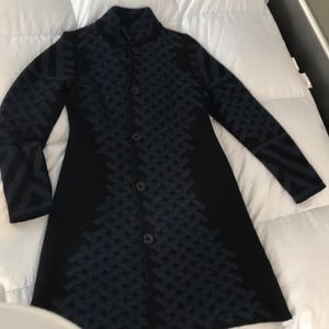 Woman’s long sweater button up
